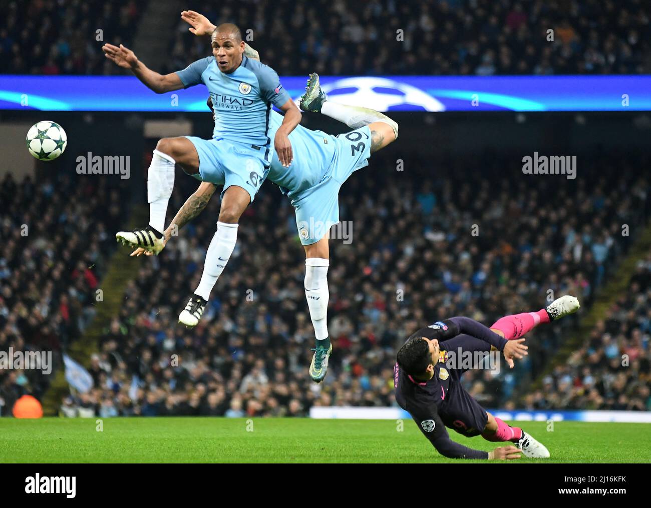 MANCHESTER, ENGLAND - NOVEMBER 1, 2016: Fernando (L), Nicolas Otamendi (R) of City and Luis Suarez (down) of Barcelona pictured in action during the UEFA Champions League Group C game between Manchester City and FC Barcelona at City of Manchester Stadium. Copyright: Cosmin Iftode/Picstaff Stock Photo