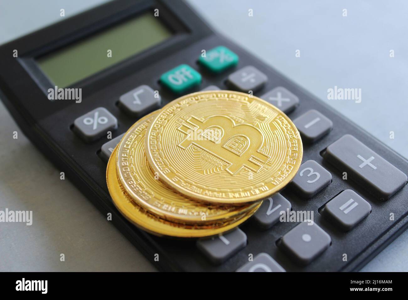 Bitcoin, ethereum, dogecoin and calculator. Cryptocurrency concept Stock  Photo - Alamy
