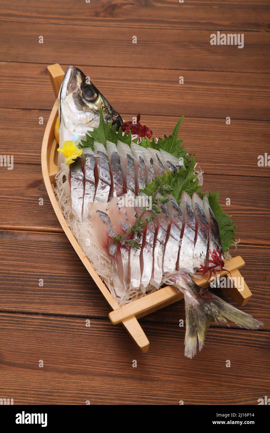 Horse Mackerel Sashimi Served like a Boat, Japanese Food Stock Photo