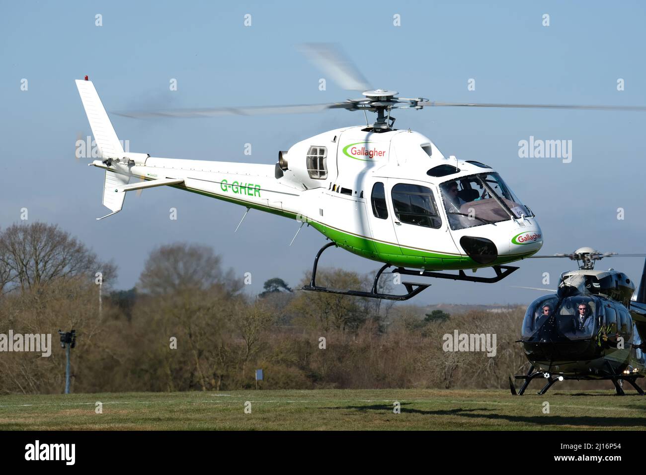 Aerospatiale AS 355 Twin Squirrel executive helicopter flying operated by the Gallagher Group Stock Photo
