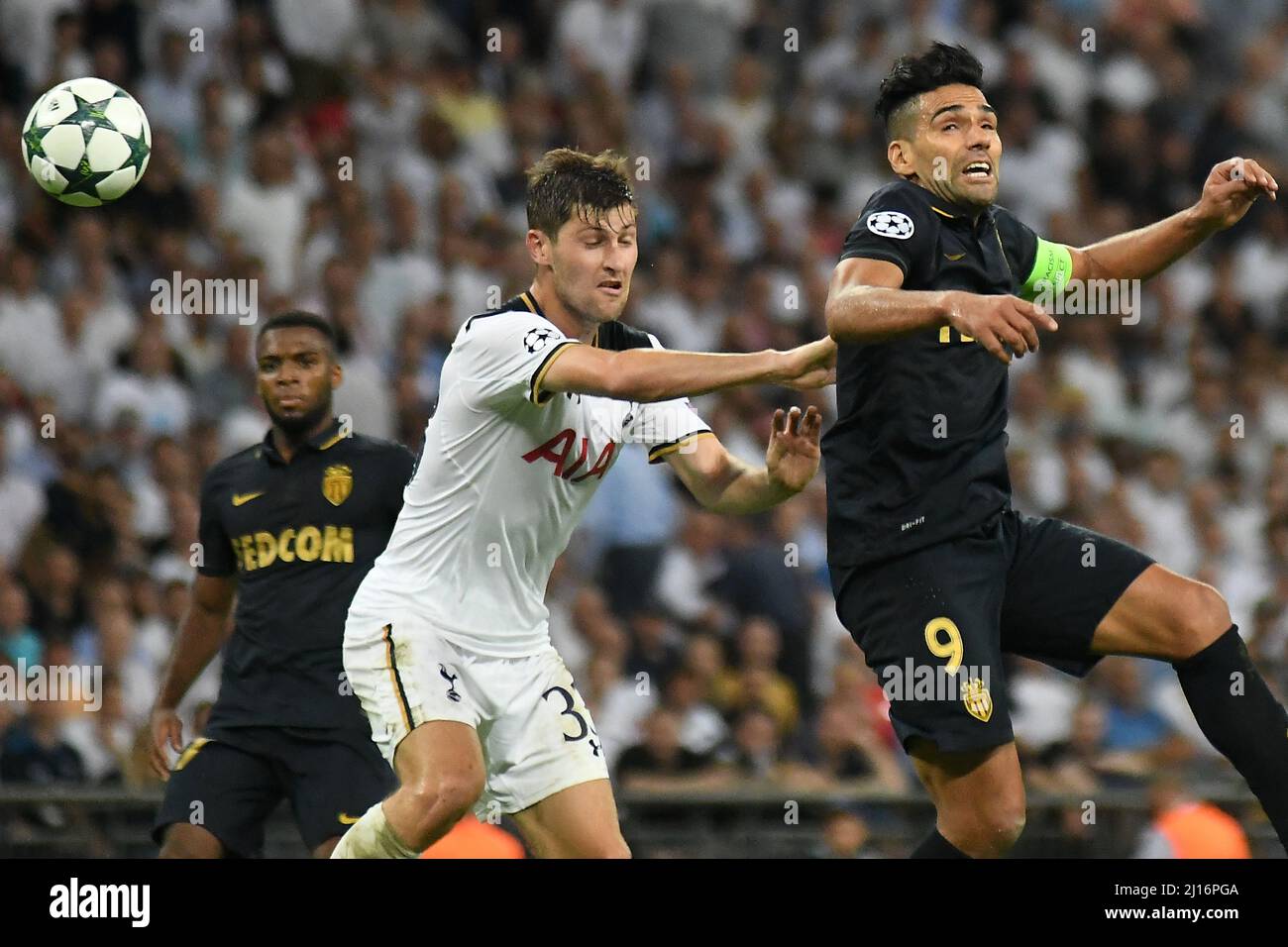 MANCHESTER, ENGLAND - SEPTEMBER 14, 2016: Ben  Davies (L) of Tottenham and Radamel Falcao (R) of Monaco pictured in action during the UEFA Champions League Group E game between Tottenham Hotspur and AS Monaco at Wembley Stadium. Copyright: Cosmin Iftode/Picstaff Stock Photo