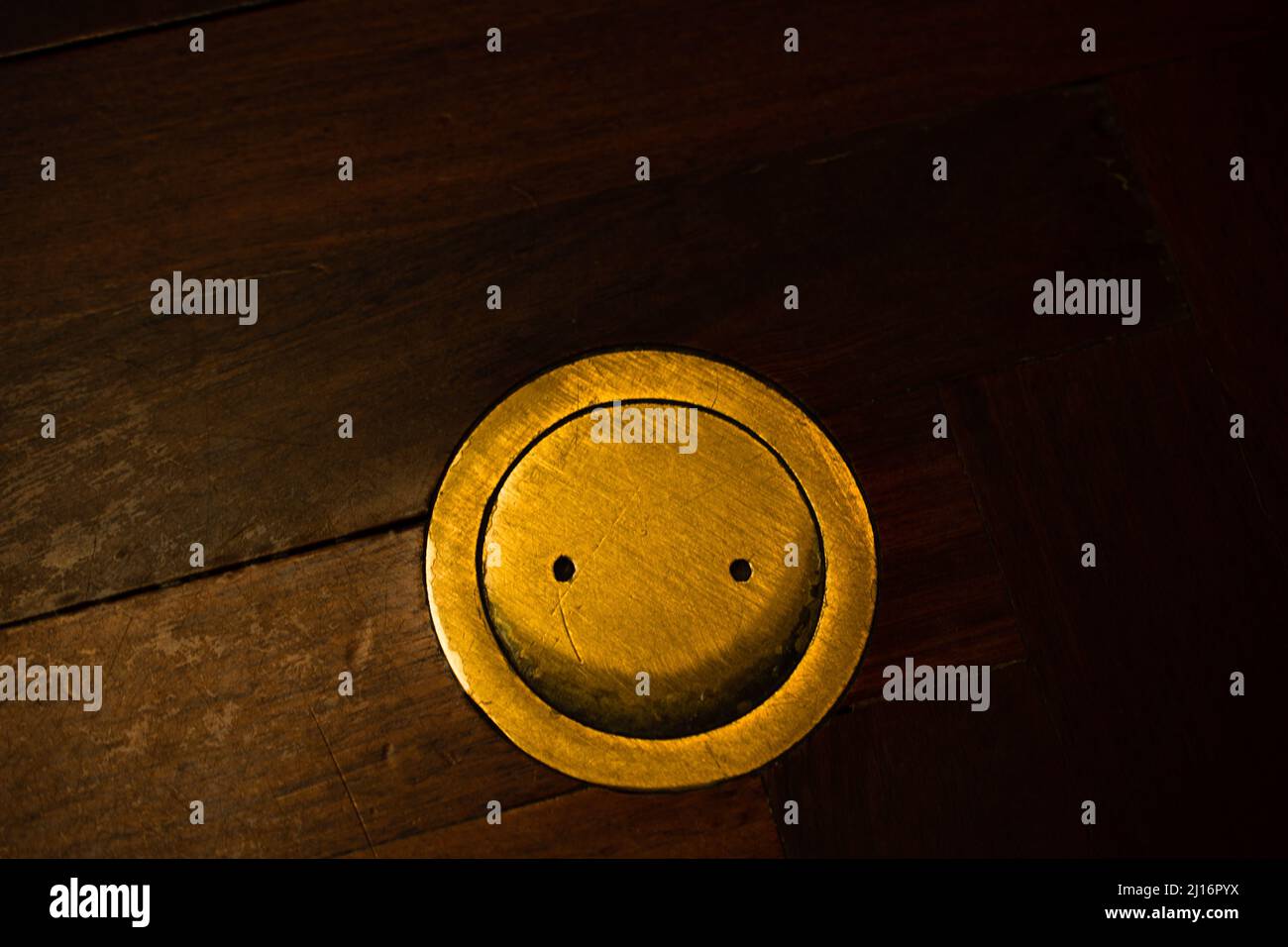 brass plate smiley face Stock Photo