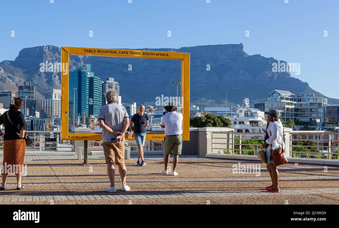 Cape Town, South Africa, 26th February - 2022: Tourists taking selfies with city and mountain as backdrop. Stock Photo