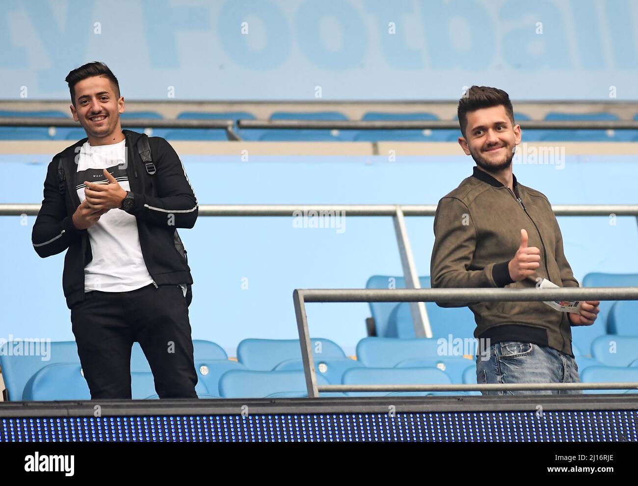 MANCHESTER, ENGLAND - AUGUST 24, 2016: Two fans pictured prior to the second leg of the 2016/17 UEFA Champions League tie between Manchester City (Engalnd) and FCSB (Romania) at Etihad Stadium. Copyright: Cosmin Iftode/Picstaff Stock Photo