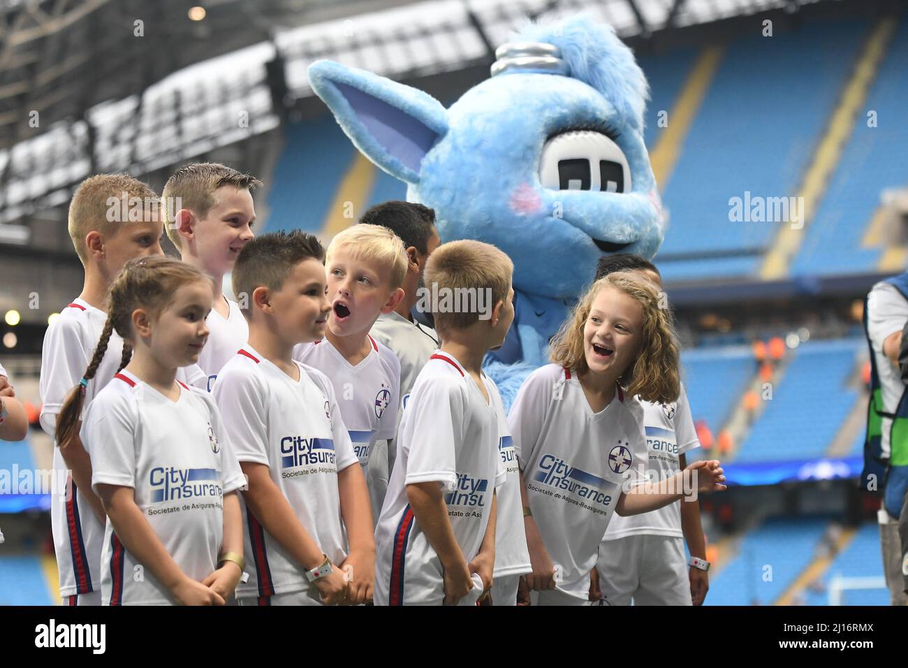 MANCHESTER, ENGLAND - AUGUST 24, 2016: The player escort kids pictured prior to the second leg of the 2016/17 UEFA Champions League tie between Manchester City (Engalnd) and FCSB (Romania) at Etihad Stadium. Copyright: Cosmin Iftode/Picstaff Stock Photo