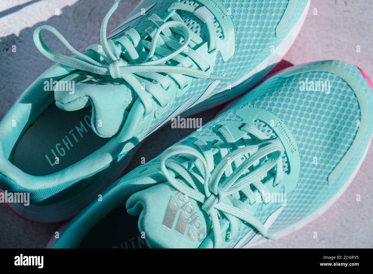 Kiev Ukraine - October 2021 Adidas swift run shoes for running for woman -  illustrative editorial Blue and pink trendy Adidas Running boots. Multinati  Stock Photo - Alamy