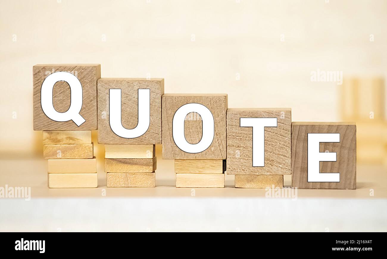 Quotes word from wooden blocks with letters, citation official notice