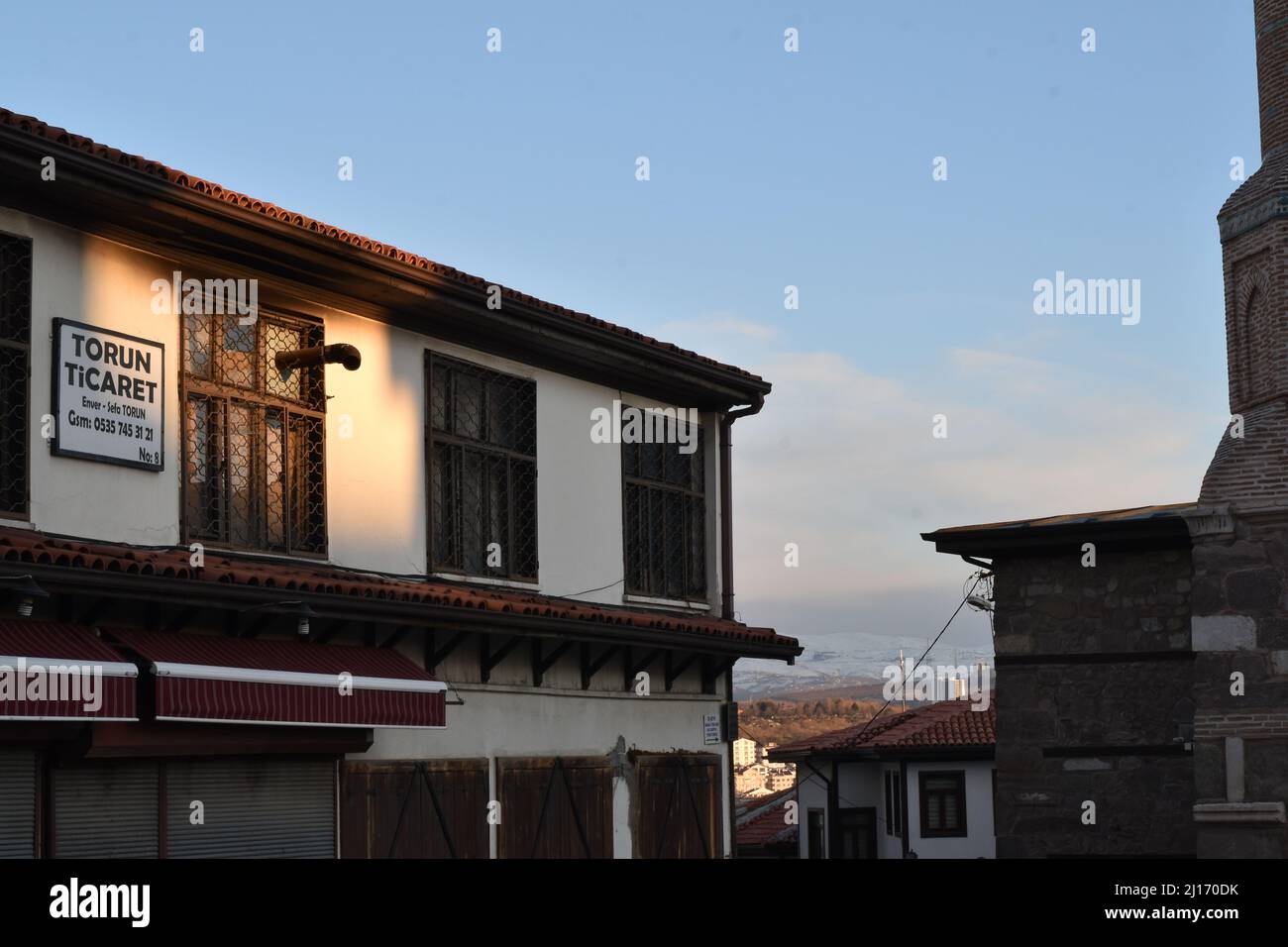 Ankara - Castle Area - Old Town (with the city of Ankara and snow-capped mountains in the background) Stock Photo