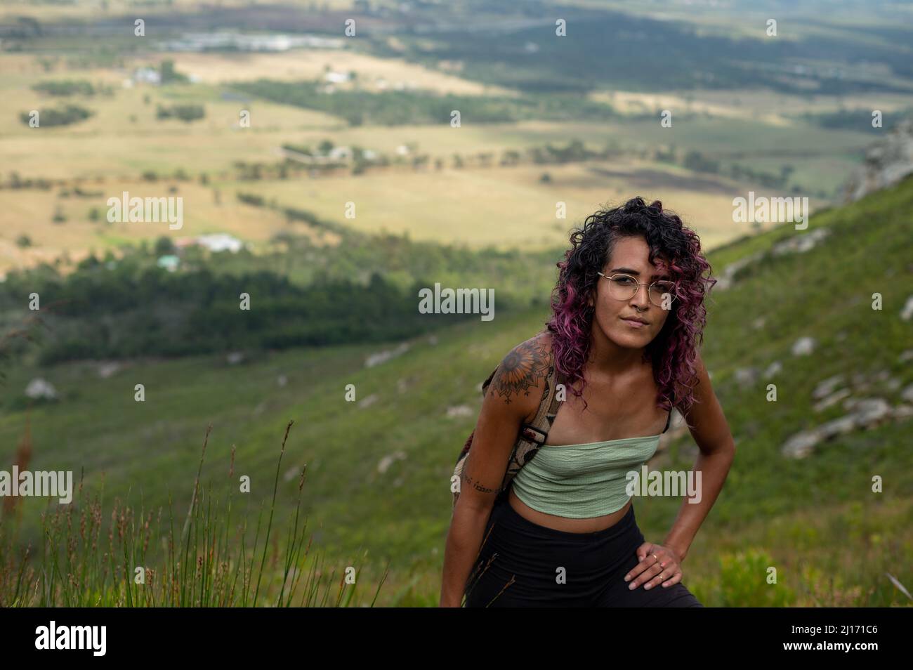 Woman traveler hiking alone hi-res stock photography and images - Alamy