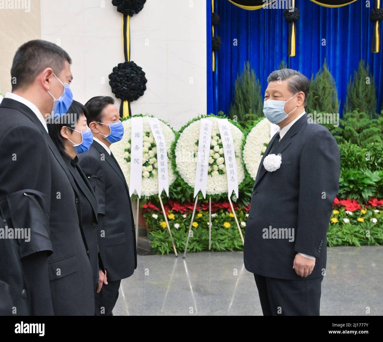 Beijing, China. 23rd Mar, 2022. Xi Jinping offers his condolences to He Luli's family, in Beijing, capital of China, March 23, 2022. He Luli, former leader of the Revolutionary Committee of the Chinese Kuomintang, was cremated in Beijing on Wednesday. Xi Jinping, Li Zhanshu, and Wang Yang attended the funeral at the Babaoshan Revolutionary Cemetery on Wednesday morning. Credit: Li Tao/Xinhua/Alamy Live News Stock Photo