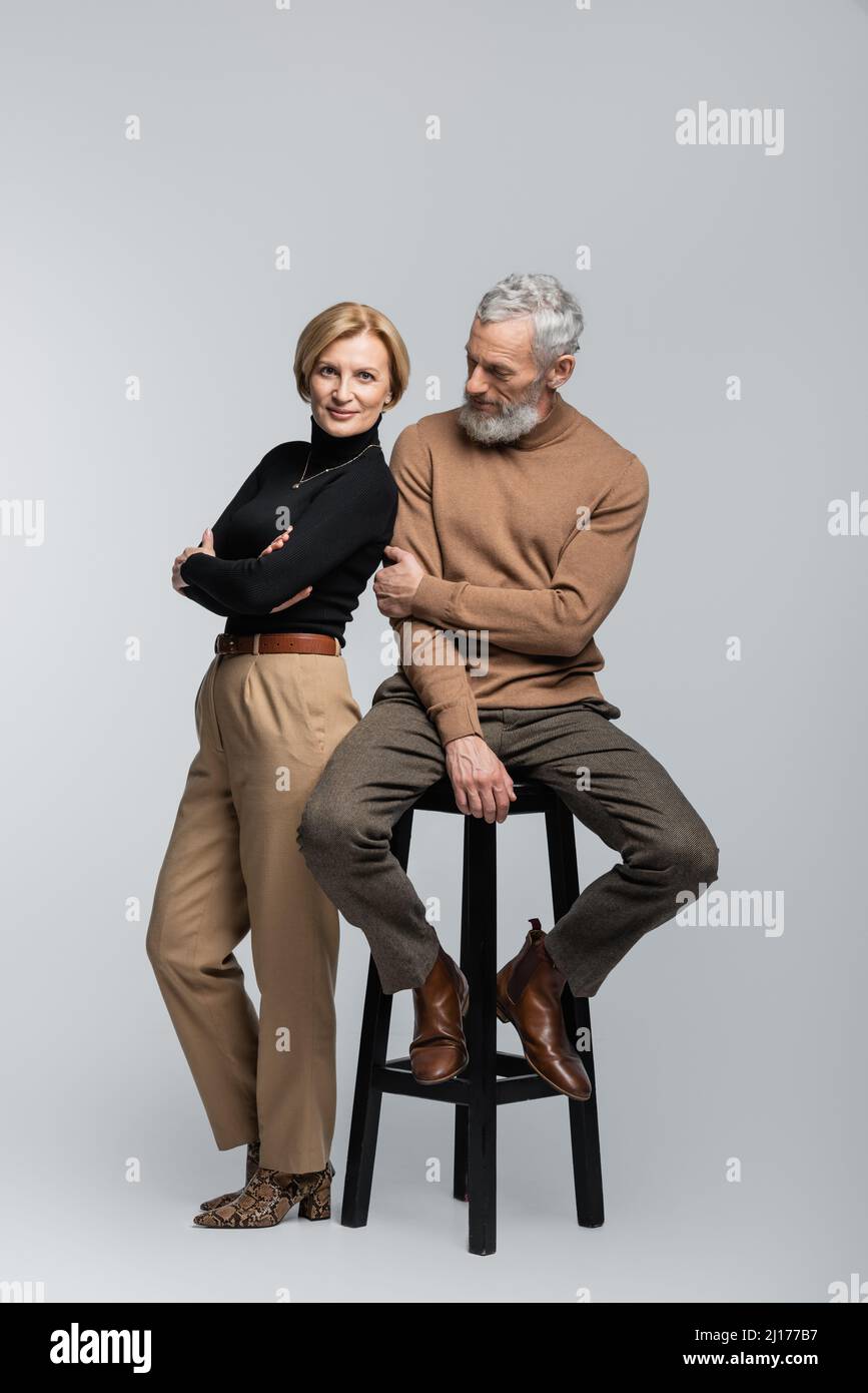 Mature woman crossing arms in hi-res stock photography and images - Alamy