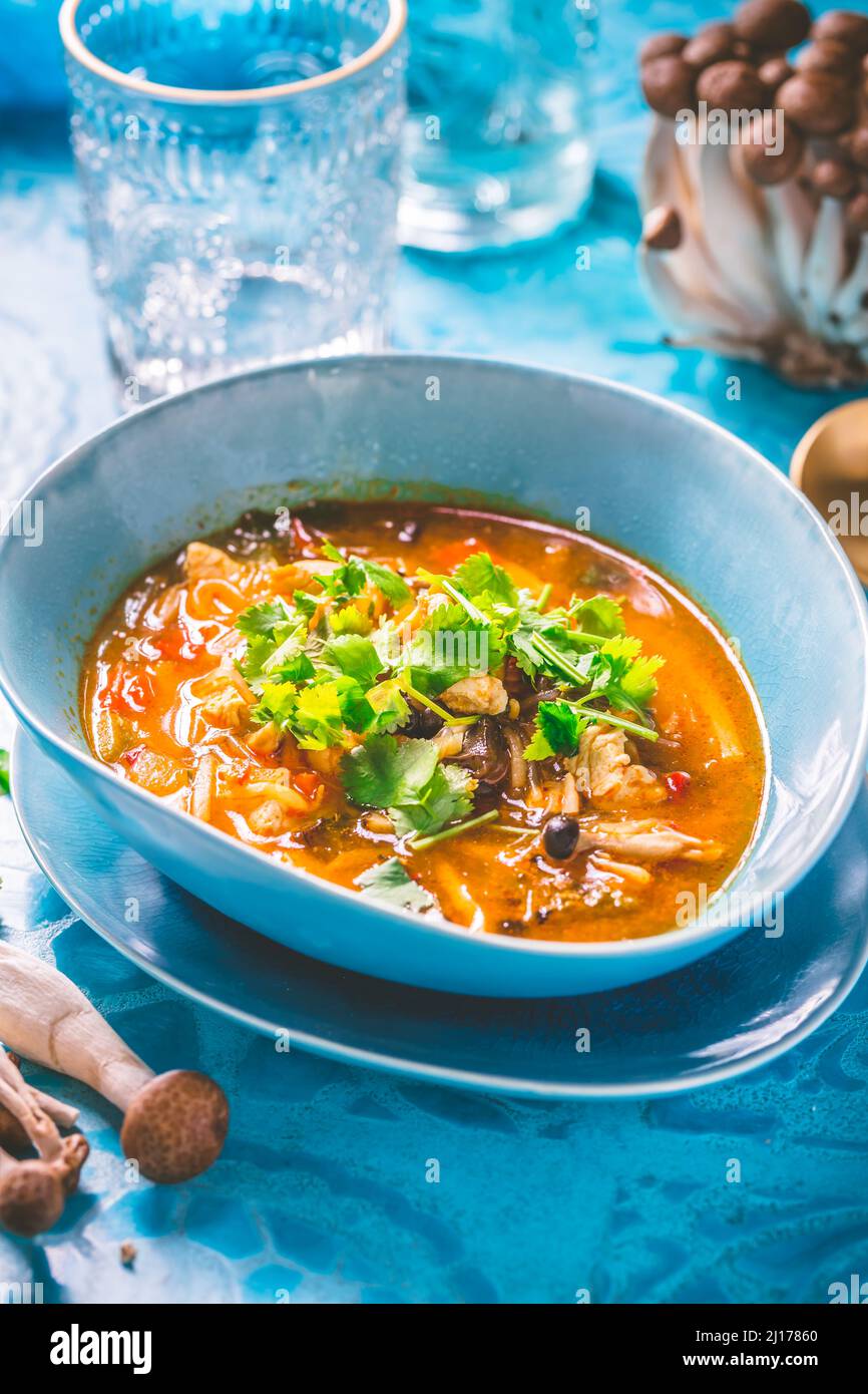 Thai chicken red curry. Thailand tradition red curry soup with chicken, mushrooms and coconut