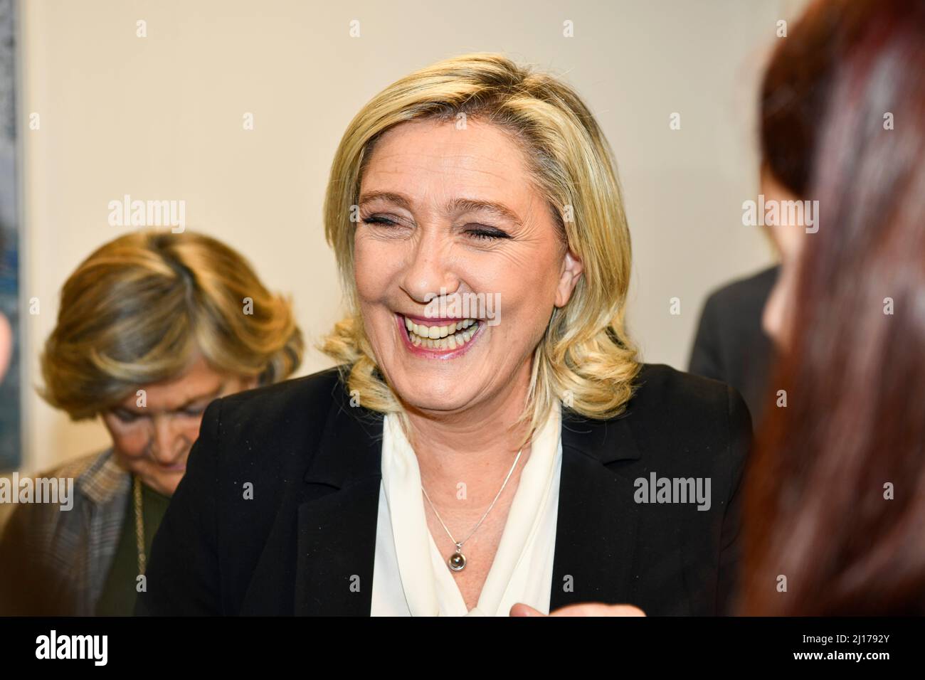 Marine Le Pen, candidate of the political party 'le Rassemblement National' (RN) for the French presidential election laughs, during an event where sh Stock Photo