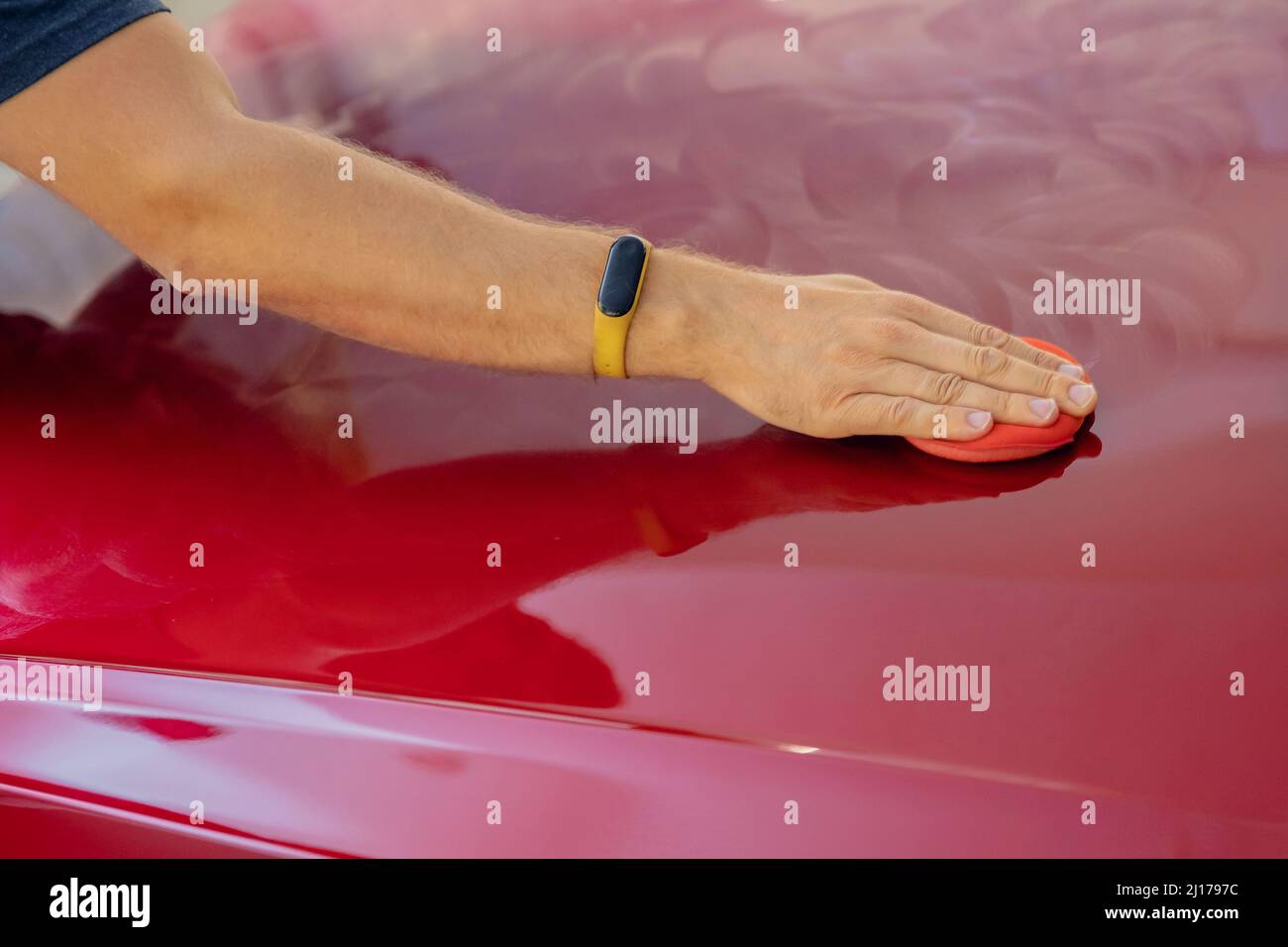 Preparing for pasting protective film vinyl. Manual car wash