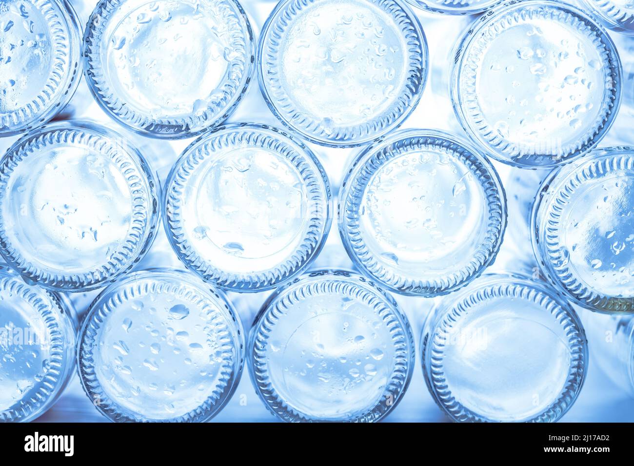 Empty glass bottles ready for recycling Stock Photo