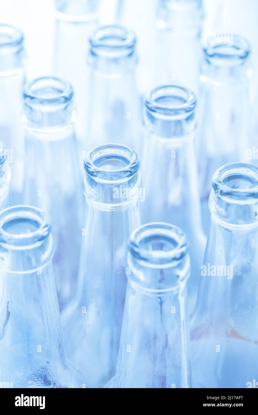 Empty glass bottles ready for recycling Stock Photo