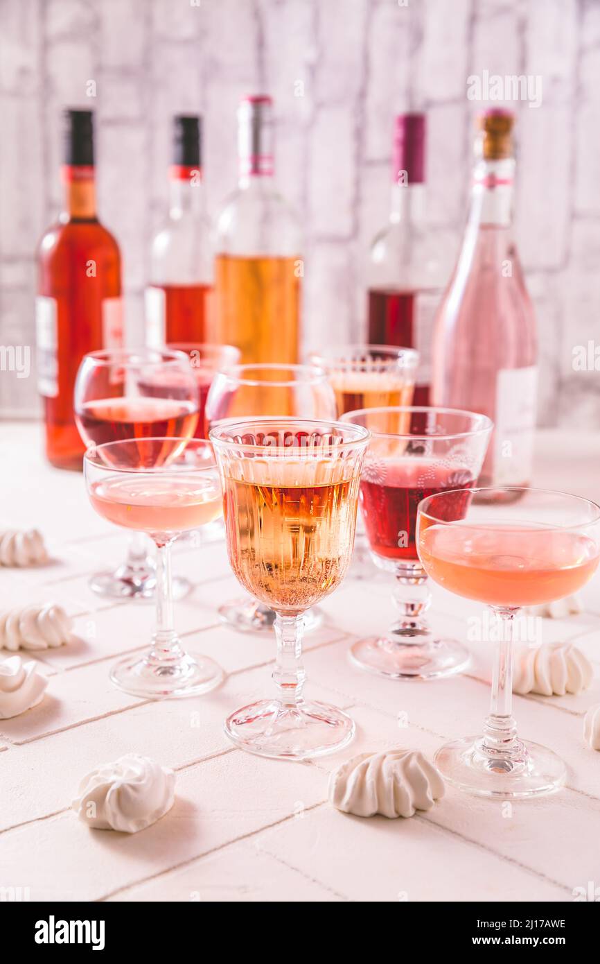 Assortment of rose wine, champagne, cocktails with bottles Stock Photo