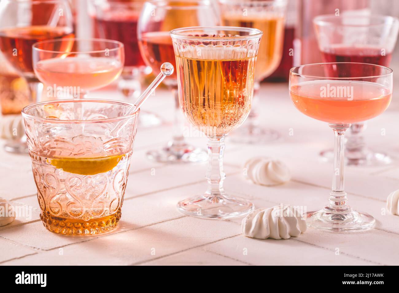 Assortment of rose wine, champagne, cocktails with bottles Stock Photo