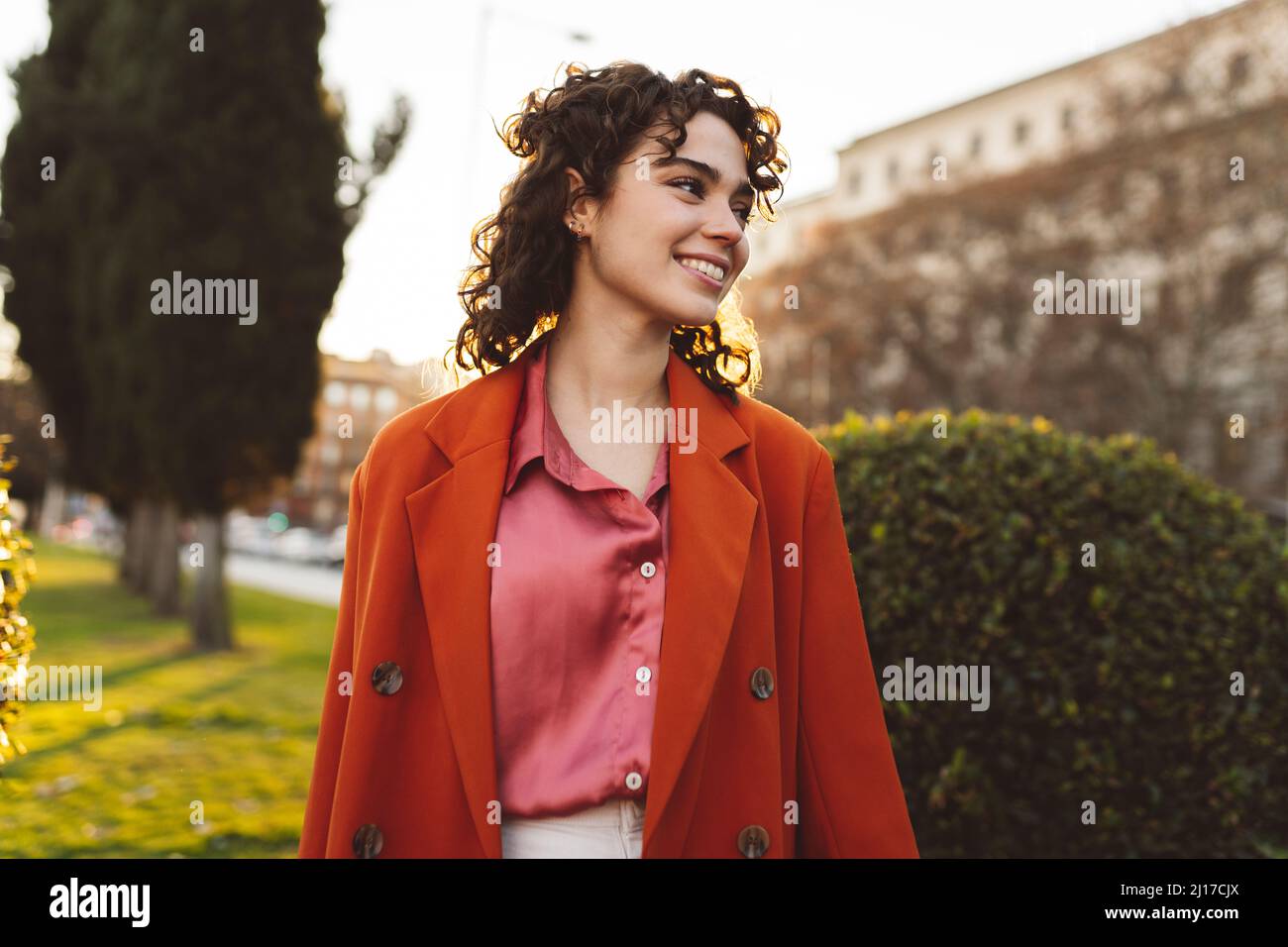 Woman contemplative city park hi-res stock photography and images - Alamy