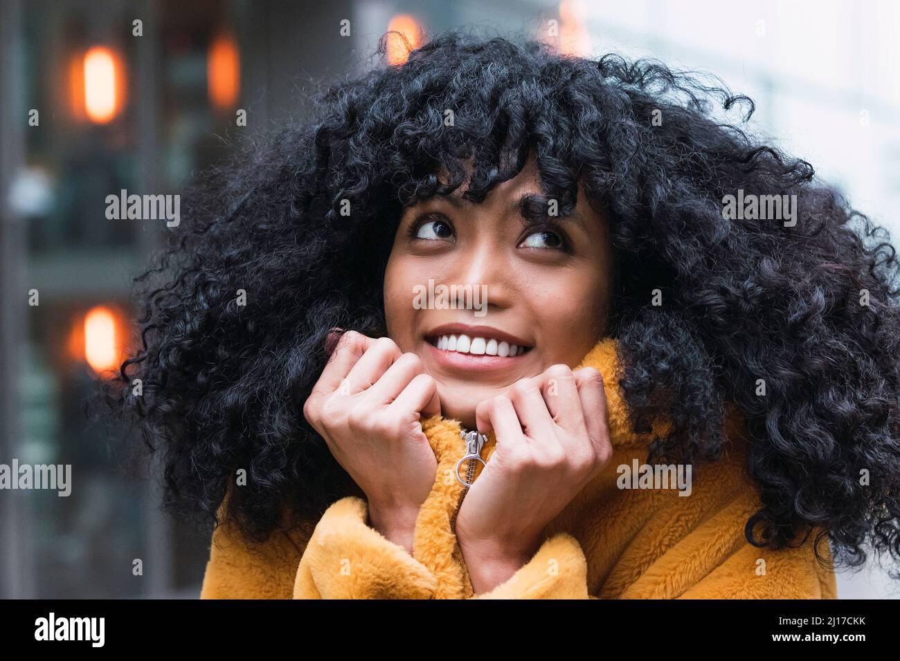 Black curly hi-res stock photography and images - Alamy