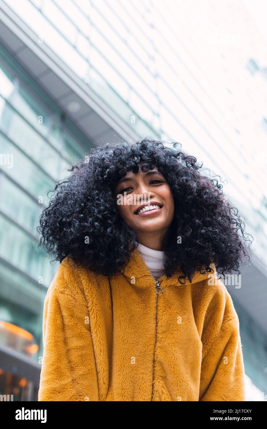 Woman curly hair warm hi-res stock photography and images - Alamy