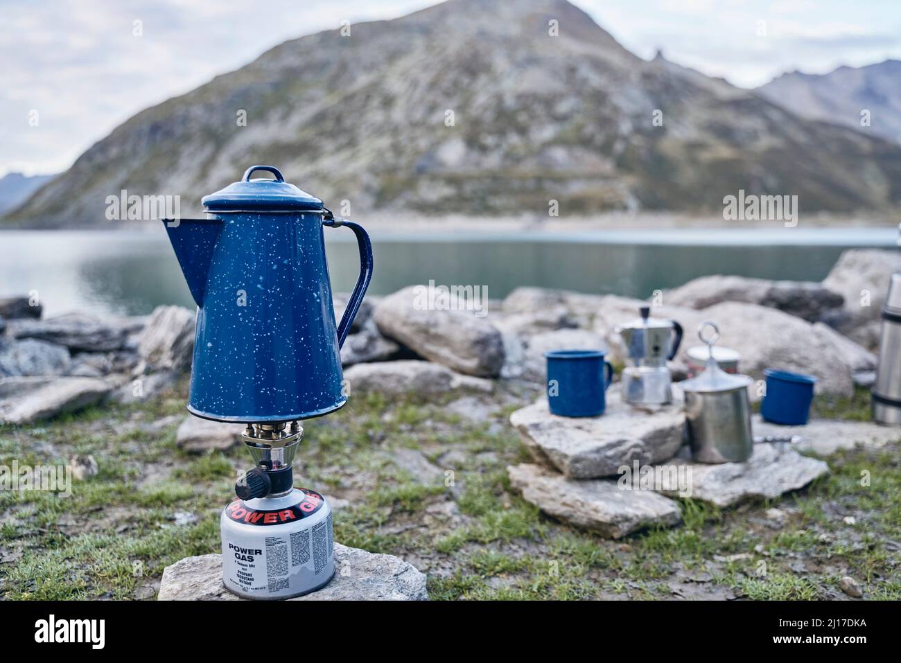 Coffee pot on gas stove burner by lake, Splugen Pass, Sondrio, Italy Stock Photo Alamy