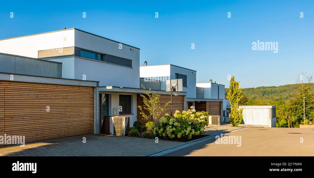 Germany, Baden-Wurttemberg, Blaustein, Modern suburban houses in summer Stock Photo