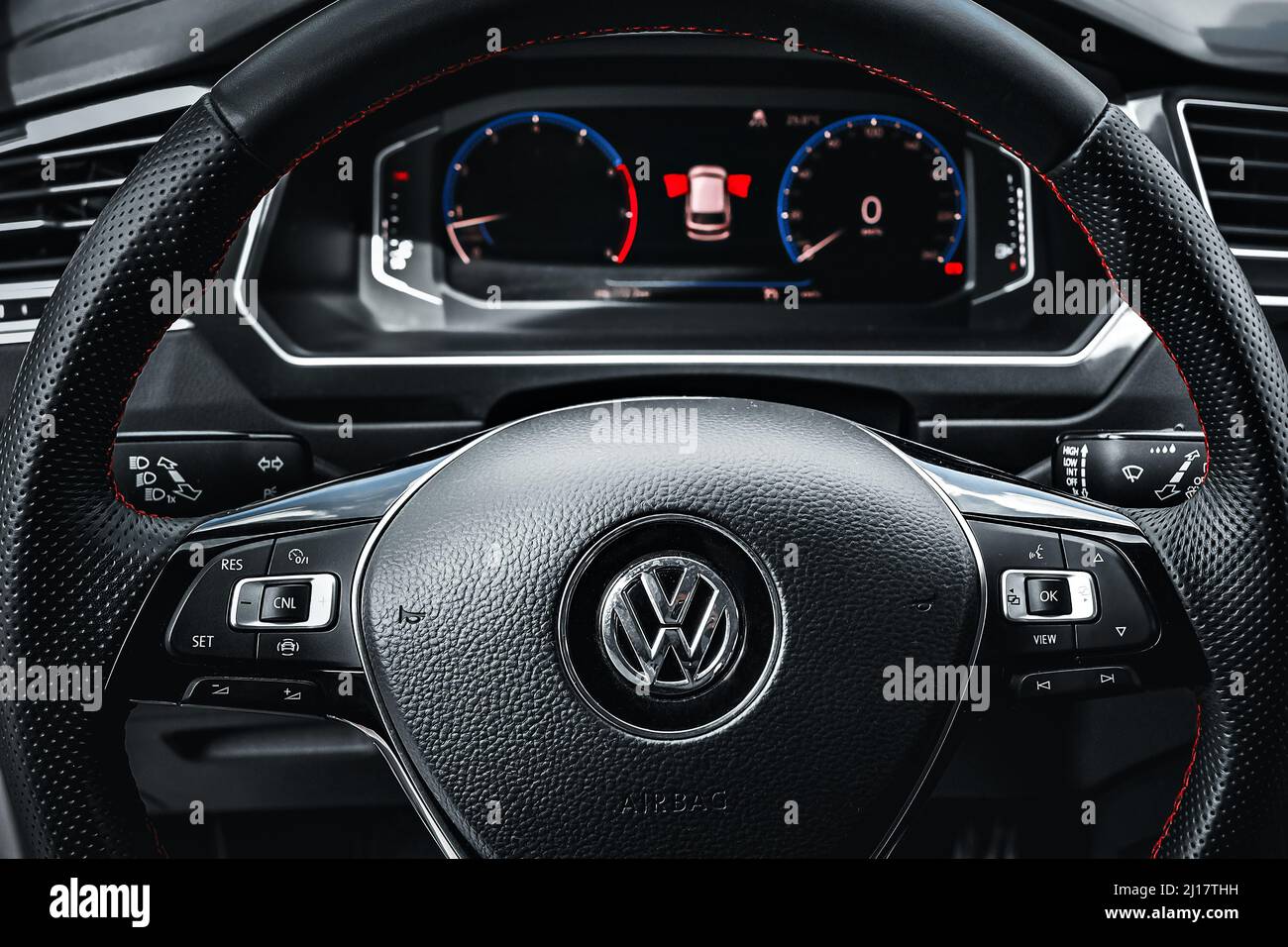 Barnaul, Russia 11.07.2021. Interior of Volkswagen Tiguan crossover. Details of steering wheel with logo and instrument panel. First-person view. Editorial use. Stock Photo