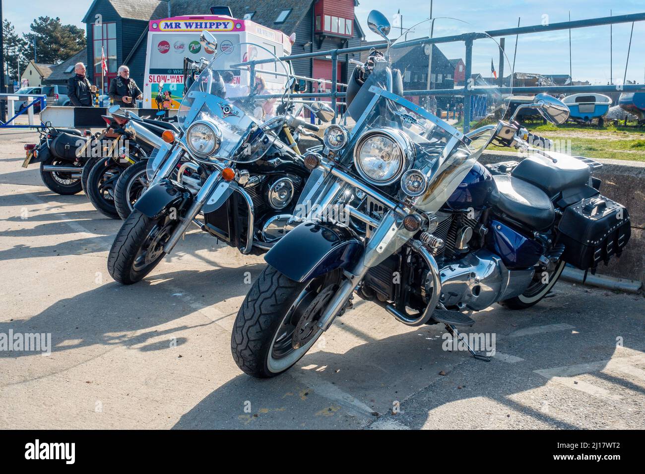 Susuki Boulevard,and,Kawasaki Vulcan, VN1600,Motorcycles,Parked at Whitstable Harbour,Whitstable,Kent,Riders queueing for Ice Creams Stock Photo