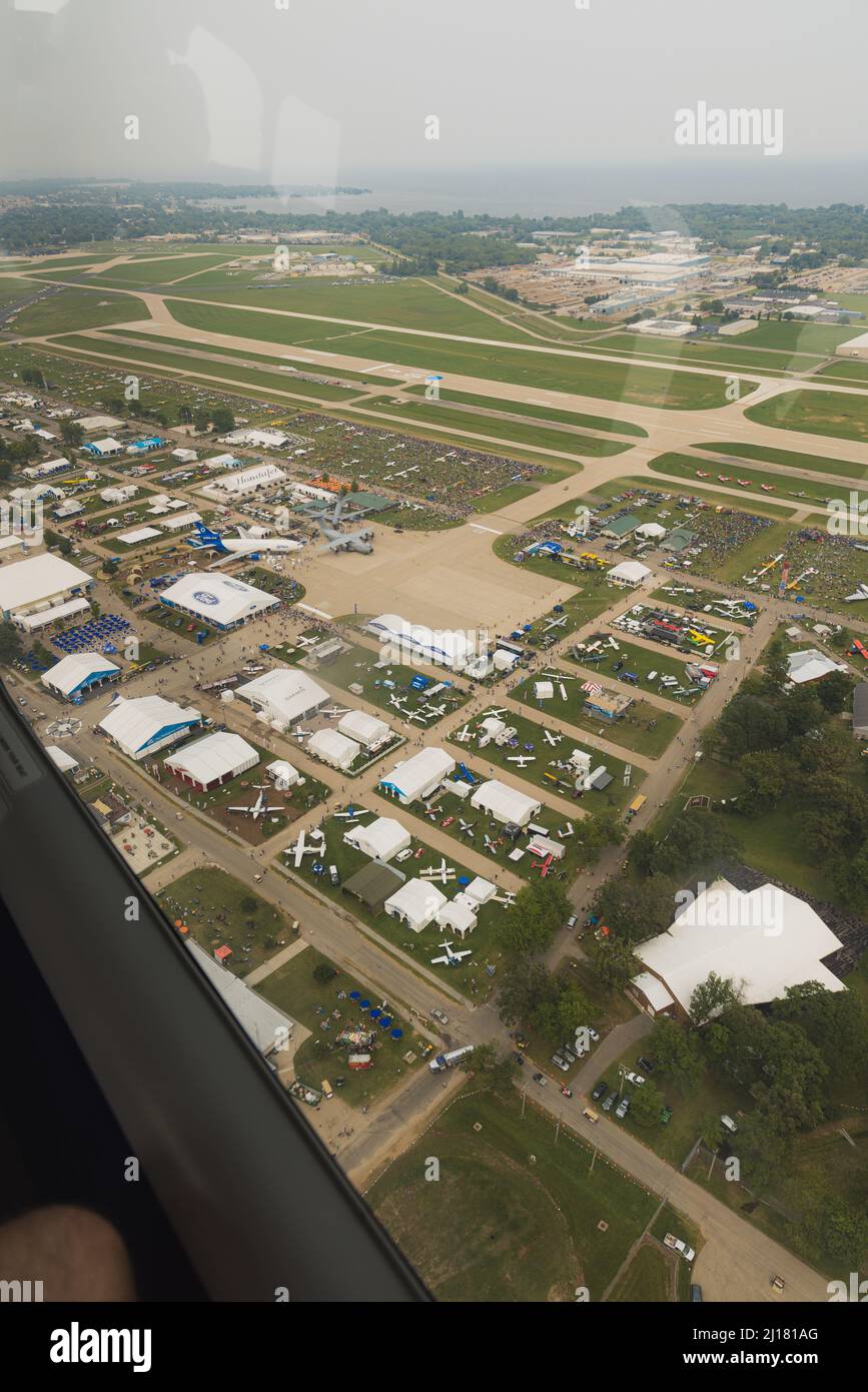 An aerial view of EAA Airventure grounds with planes and tents Stock ...