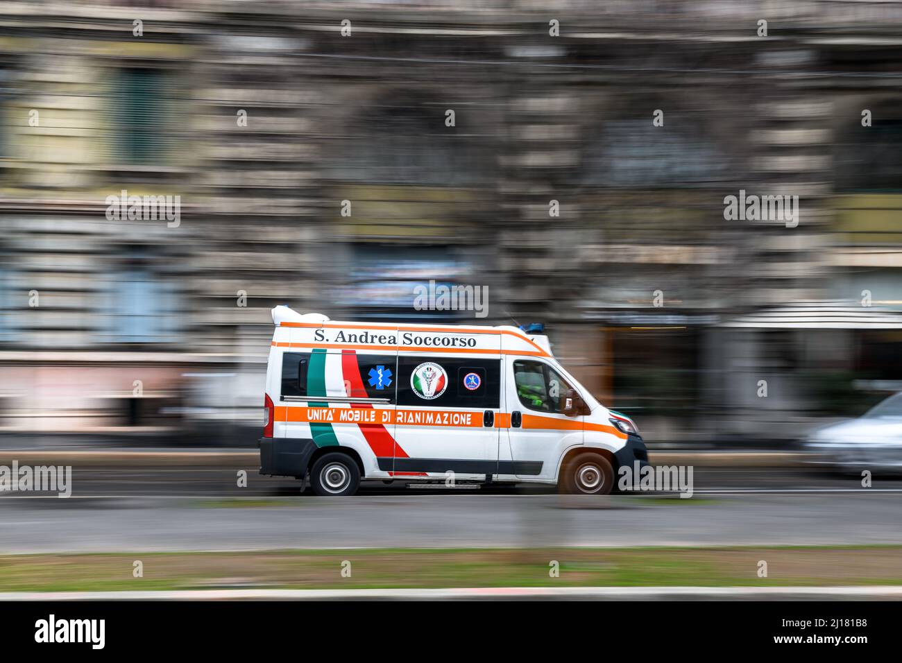 A beautiful shot of an ambulance car driving fast in Milan Stock Photo