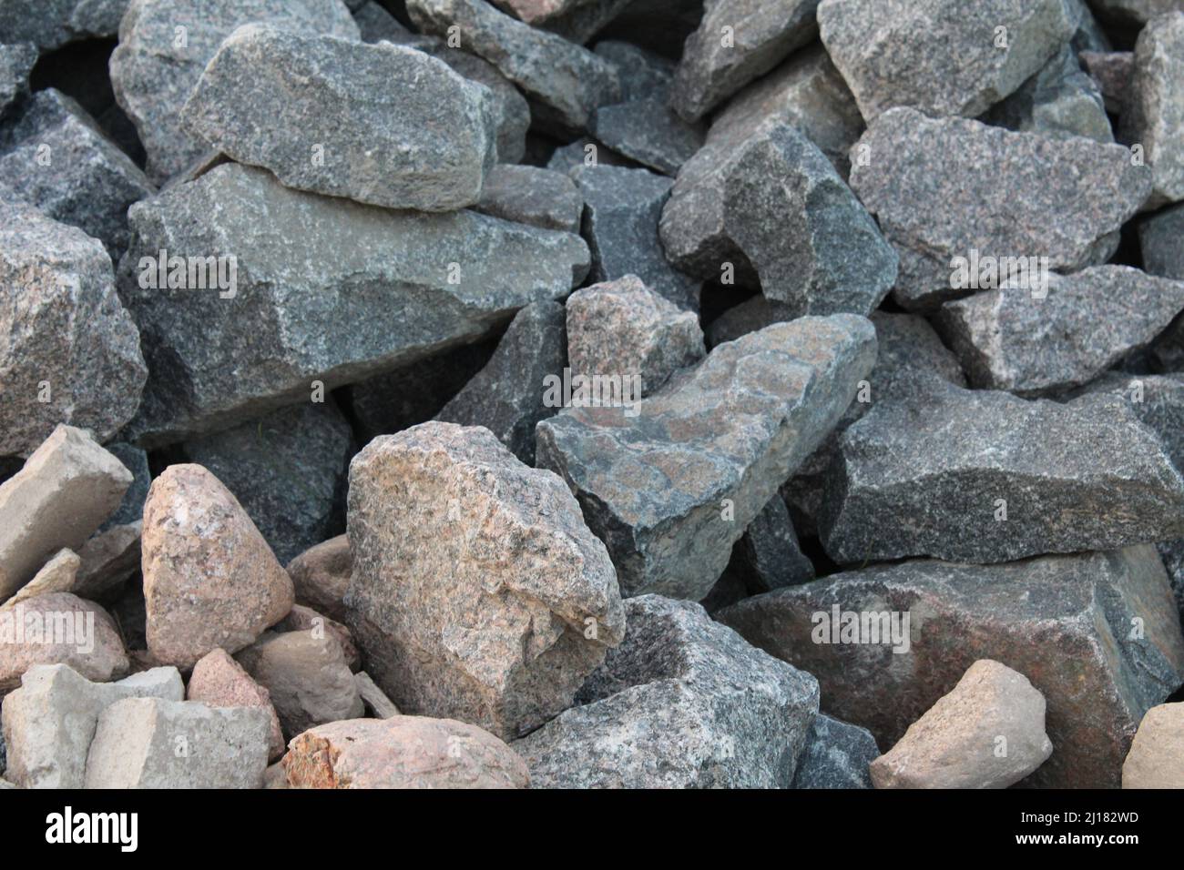 a background of cobblestone stones closeup. stones for the