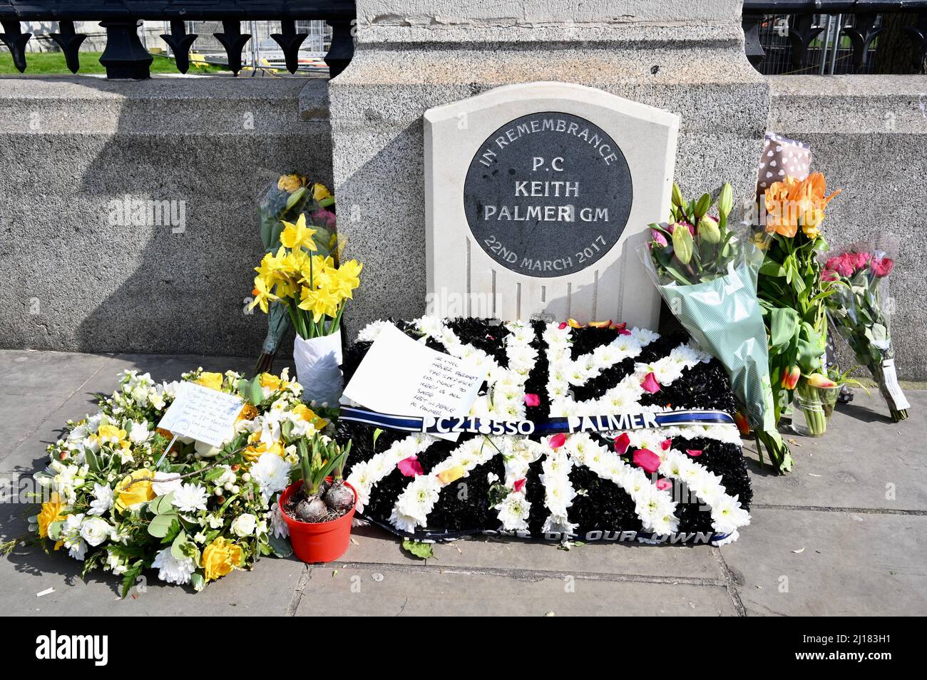 London, UK. Floral tributes were left outside the Houses of Parliament for PC Keith Palmer who was posthumously awarded the George Medal.He died defending  the Palace of Westminster from attack on 22nd March 2017. Credit: michael melia/Alamy Live News Stock Photo