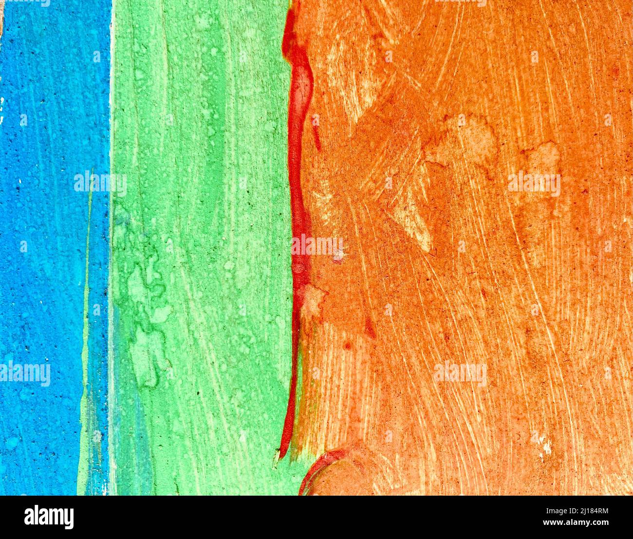a wall painted unevenly with three colored paints Stock Photo