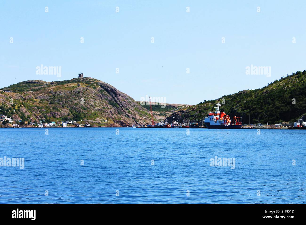 Looking across St. John's Harbour toward signal hill, with Cabot Tower. Stock Photo