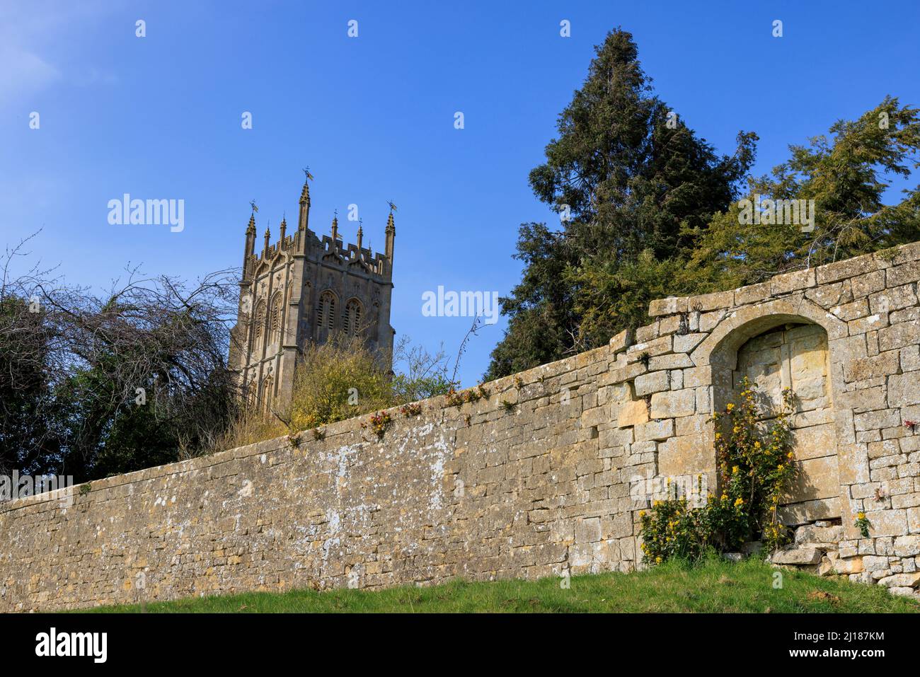 The Cotswold stone boundary wall of St James’s Church in Chipping