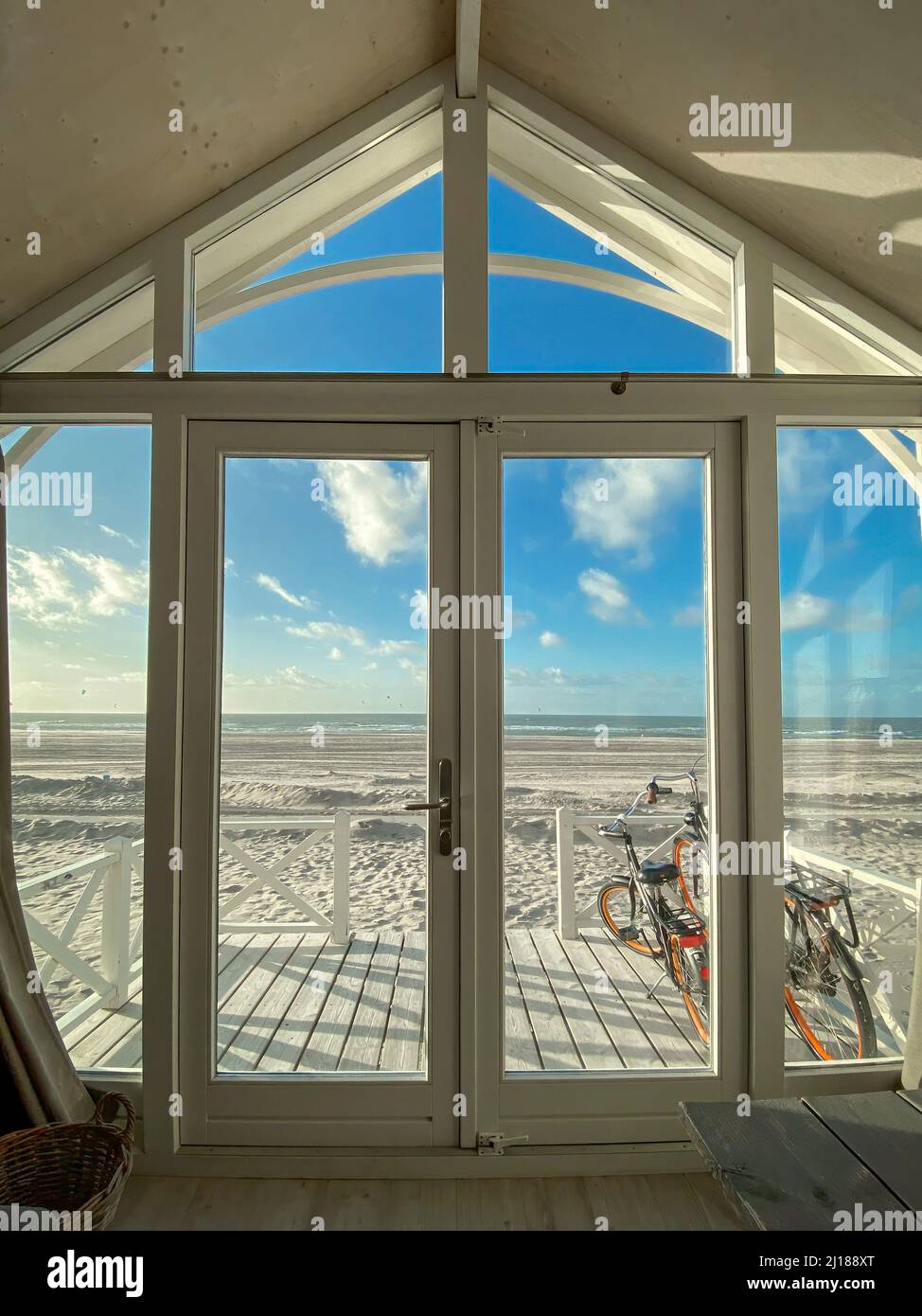 Scenic view form inside a beach hut at North Sea beach in the ...