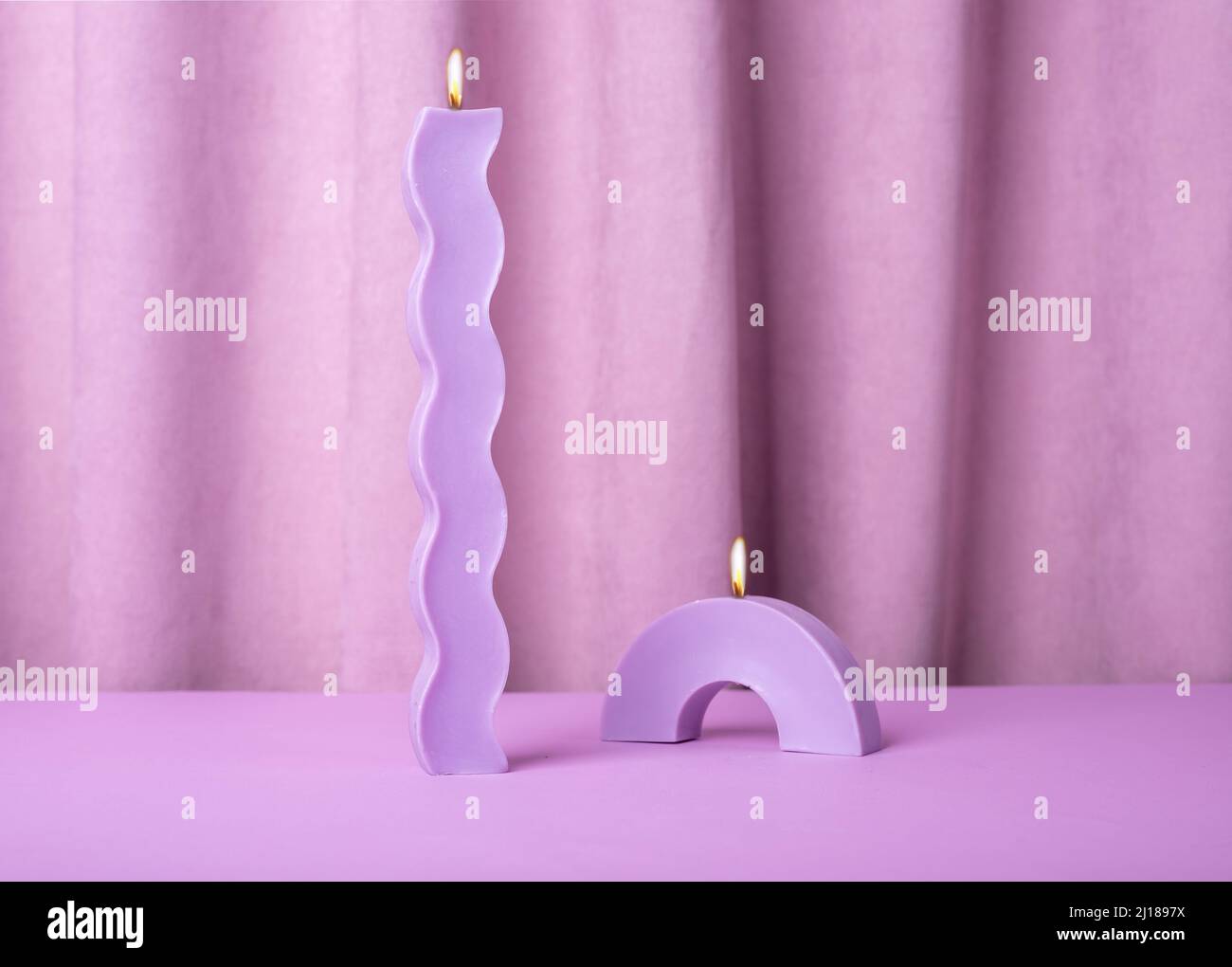 Modern trendy candles designs of geometric shapes, arch and wave with