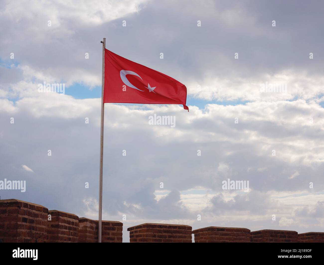 Alanya, turkey, winter walk by mediterranean sea. Kizil Kule tower on