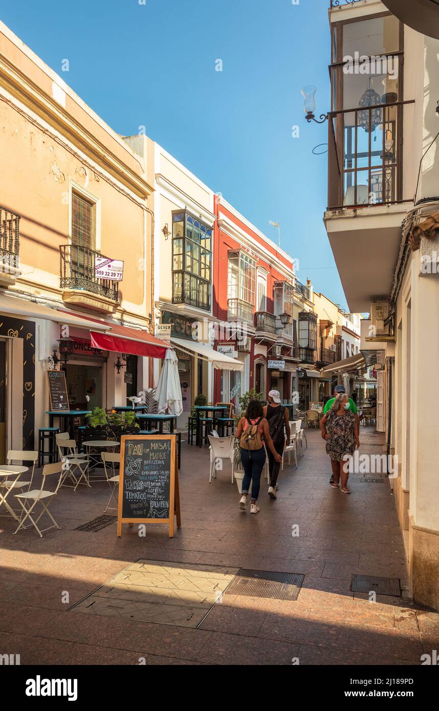 Ayamonte, Spain - July 29, 2021: Street in the center of Ayamonte in Andalusia, Spain, with bars and shops on a summer afternoon. Stock Photo