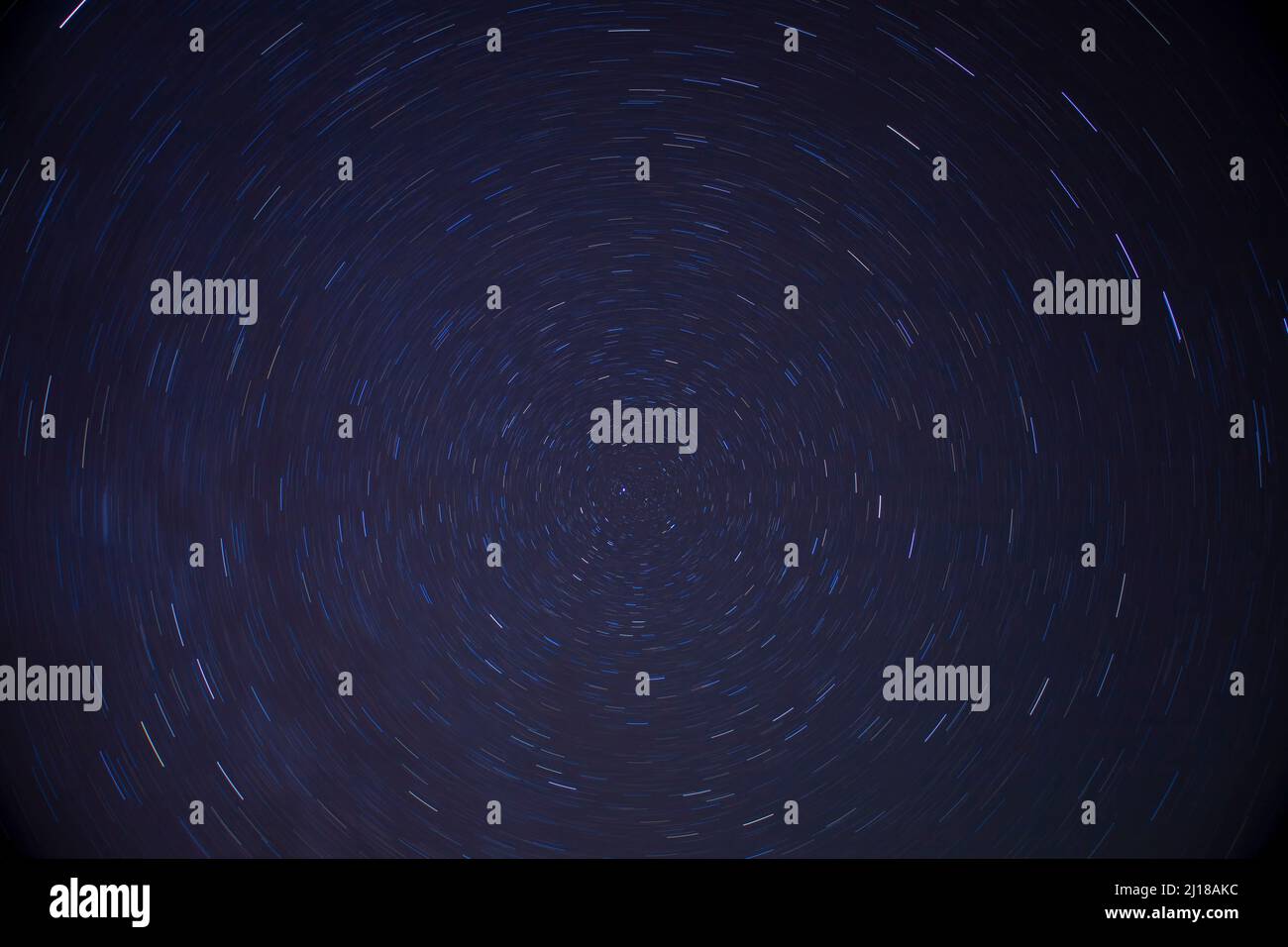 The total time interval of star trails in the night sky Stock Photo Alamy