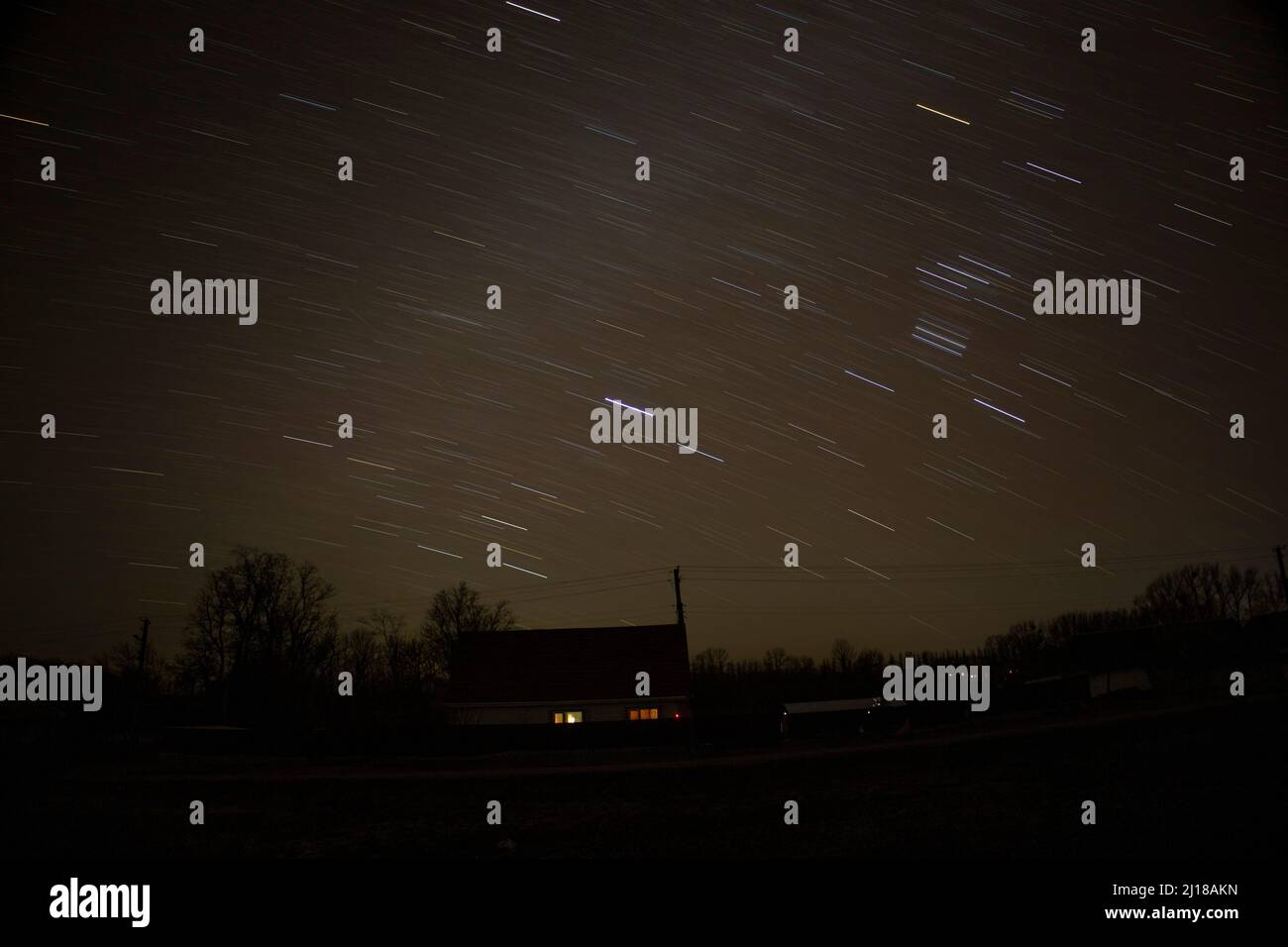The total time interval of star trails in the night sky Stock Photo Alamy