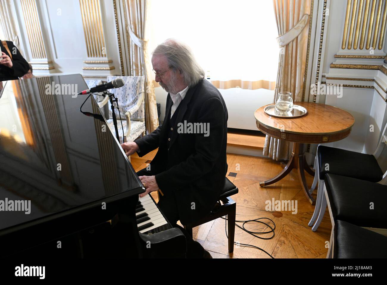 Benny Andersson plays 'Thank you for the Music after ABBA was awarded the Swedish Music Export Prize 2021. The winner of the Music Export Award for 2021 was announced by the Minister for Foreign Trade and Minister for Nordic Affairs at the Ministry for Foreign Affairs in Stockholm, Sweden 23 March 2022.  Photo: Fredrik Sandberg / TT / kod 10080 Stock Photo