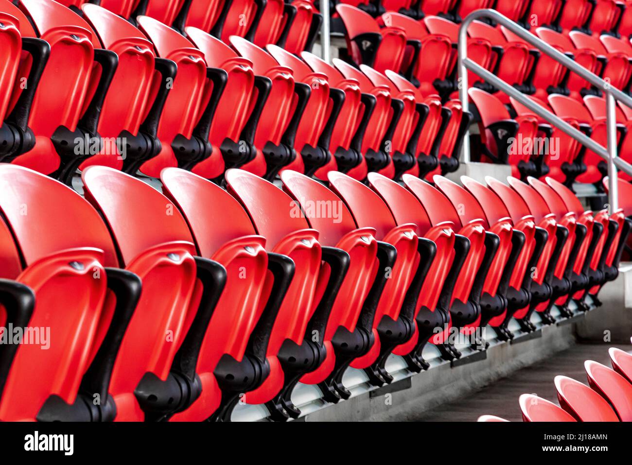 Row of Red Stadium Seats Stock Photo