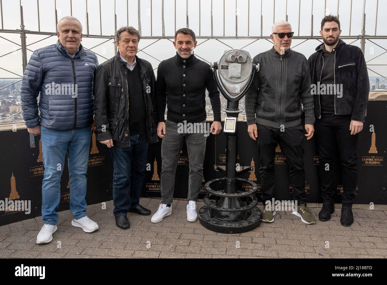 New York, USA. 23rd Mar, 2022. (L-R) Ioannis Topalidis, legendary German soccer coach Otto Rehhagel, Georgios Karagkounis, Antonis Nikopolidis, and a guest visit the Empire State Building in New York, New York, on Mar. 23, 2022, in celebration of the premiere of the critically acclaimed film, “King Otto.' (Photo by Gabriele Holtermann/Sipa USA) Credit: Sipa USA/Alamy Live News Stock Photo