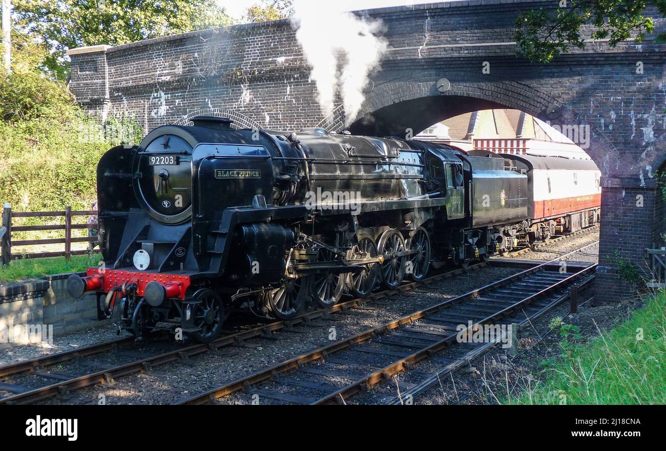 Steam Train 92203 - Black Prince leaving Weybourne Station, Norfolk Stock Photo
