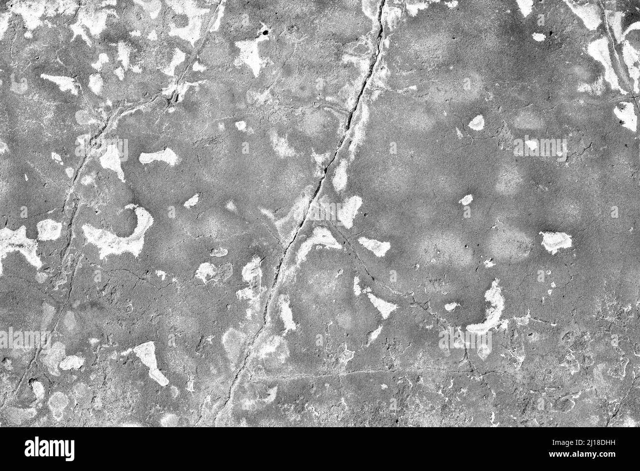 Cracked gray stone wall surface with spots and stains Stock Photo Alamy