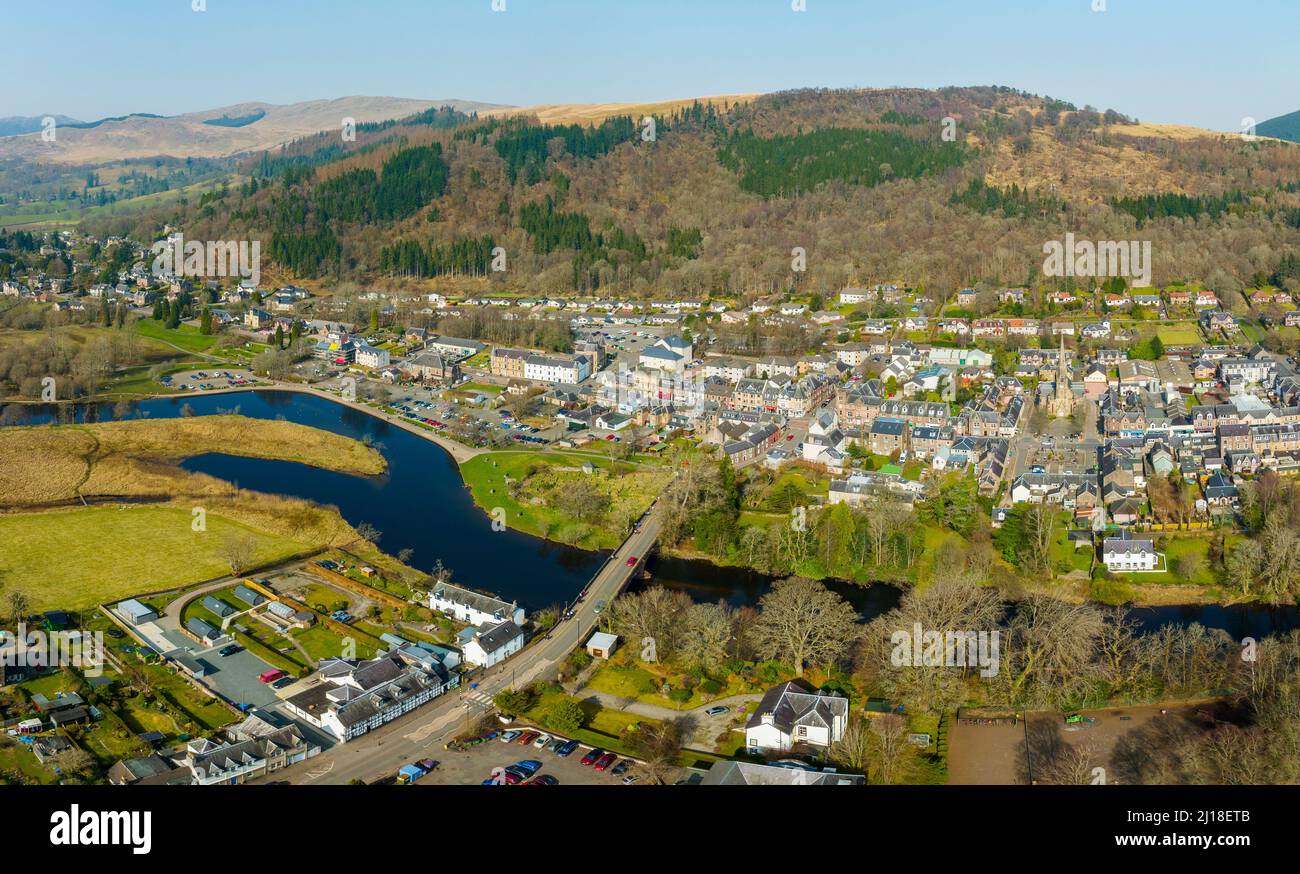 Aerial view from drone of village of Callander on the River Teith in The Loch Lomond and Trossachs National Park in Perthshire in Scotland, UK. Stock Photo