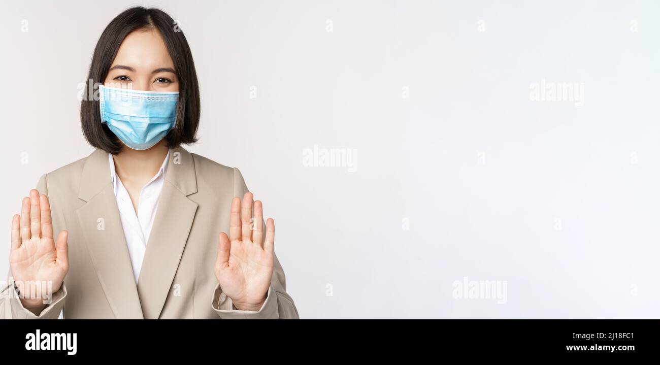 Coronavirus and work concept. Portrait of asian female office lady