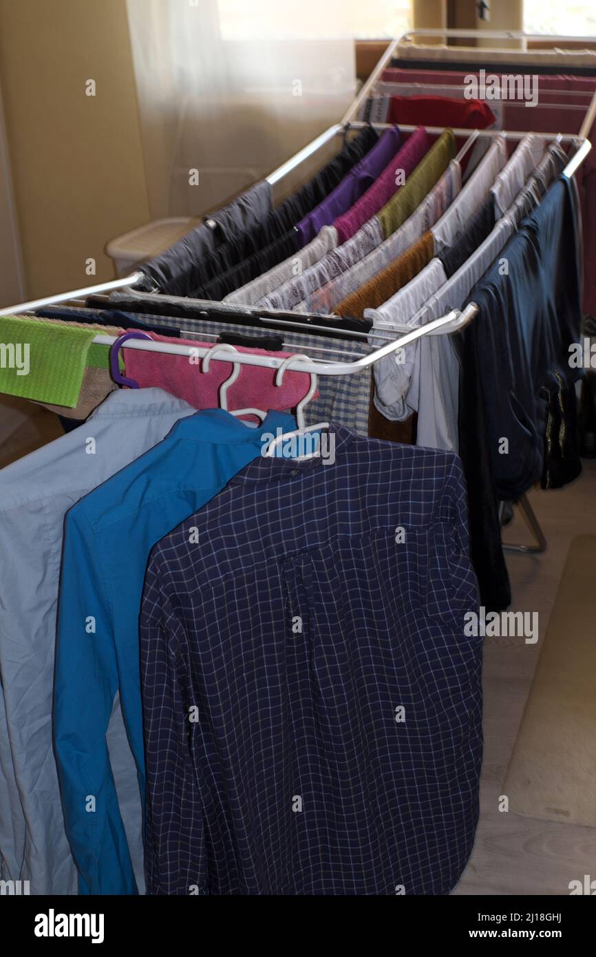 Laundry rack with washed laundry Stock Photo